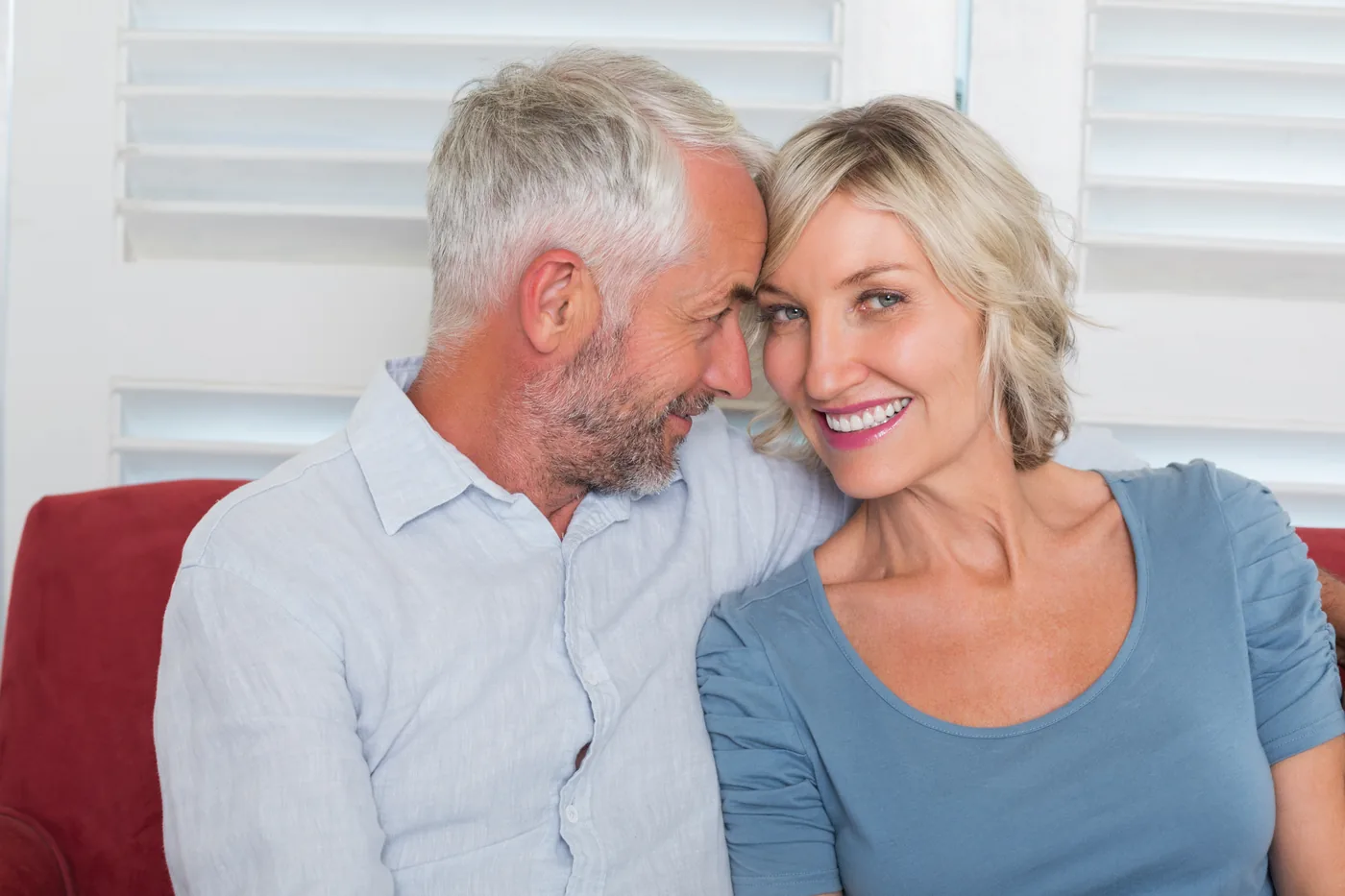 Mature couple sharing an affectionate moment — Senior Dating Websites vs Apps: What Fits You?